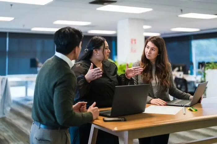 A team member at work in a busy workplace